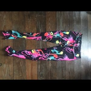 Neon paint splatter stirrup leggings